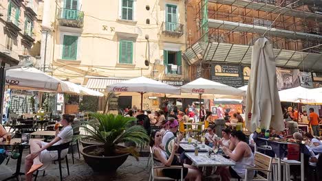 people dining at a busy outdoor café