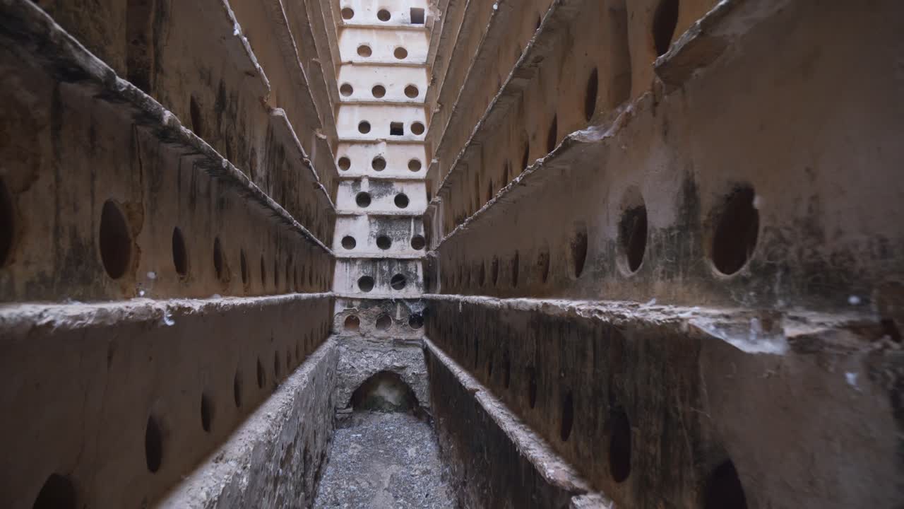 Slow pan view of an old dovecote for pigeons of the XVIII century in Cadiz, Spain,