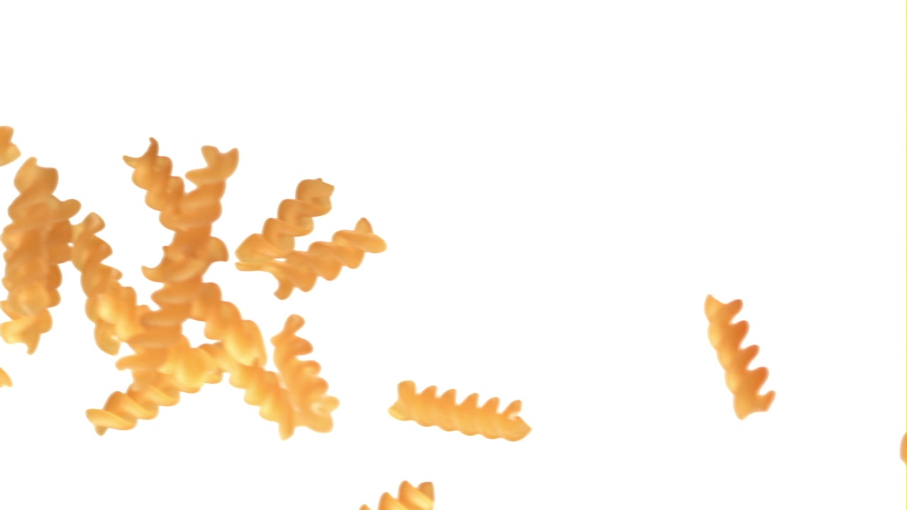 Uncooked Fusilli Pasta Falling in Slow Motion on White Background
