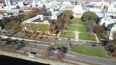 aerial view of killian court park and great dome, part of mit, boston ma usa, memorial drive traffic on sunny autumn day