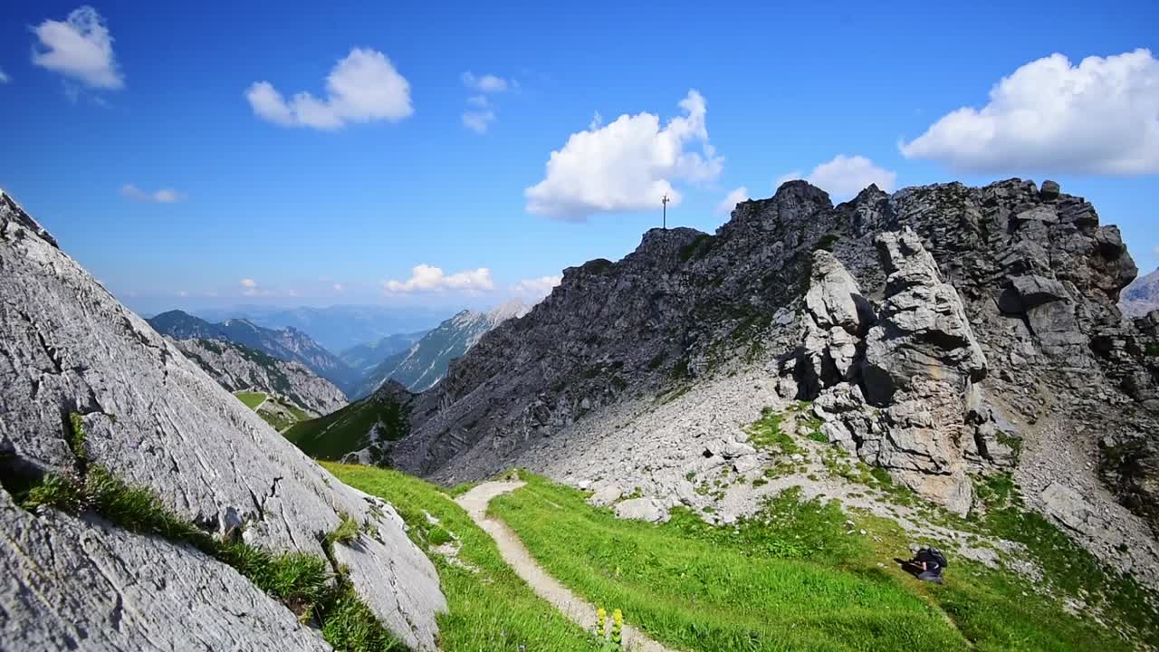 White granit walls on the mountain top of a mountain in the alps of Austria. Wide angle view, hand-held slide left