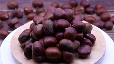 Fresh-raw-chestnuts-rotating-on-a-turntable