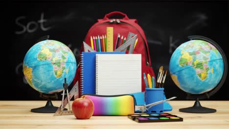 red school backpack filled with pencils, notebook, and a ruler