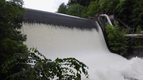 scenic shots of the cuyahoga river at gorge dam in summit county, ohio, where a man-made waterfall and reservoir meet a revitalized natural landscape near akron and cuyahoga falls.