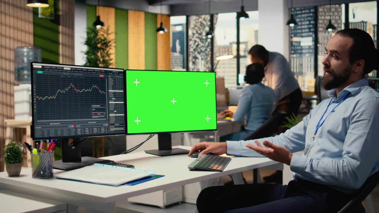 Consultant talking with clients during teleconference meeting using mockup PC