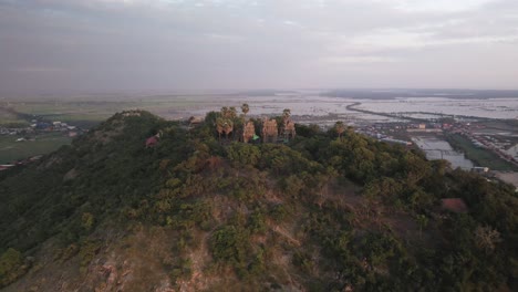 Phnom-Krom,-Angkor-temple-three-towers-on-hill,-Siem-Reap-Cambodia