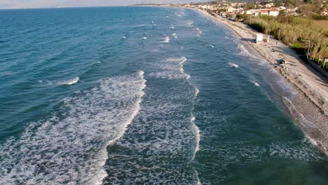 Aerial-view-of-wsindy-day-in-the-beach-in-north-corfu