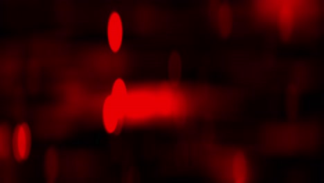 animación rápida de bokeh desfocado simulando las luces rojas del tráfico de la ciudad