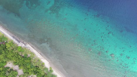 cinematic high angle top view showing colorful paradise in philippines