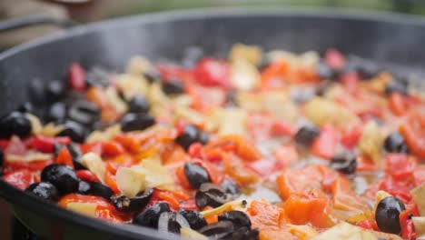 closeup on the traditional way of cooking paella