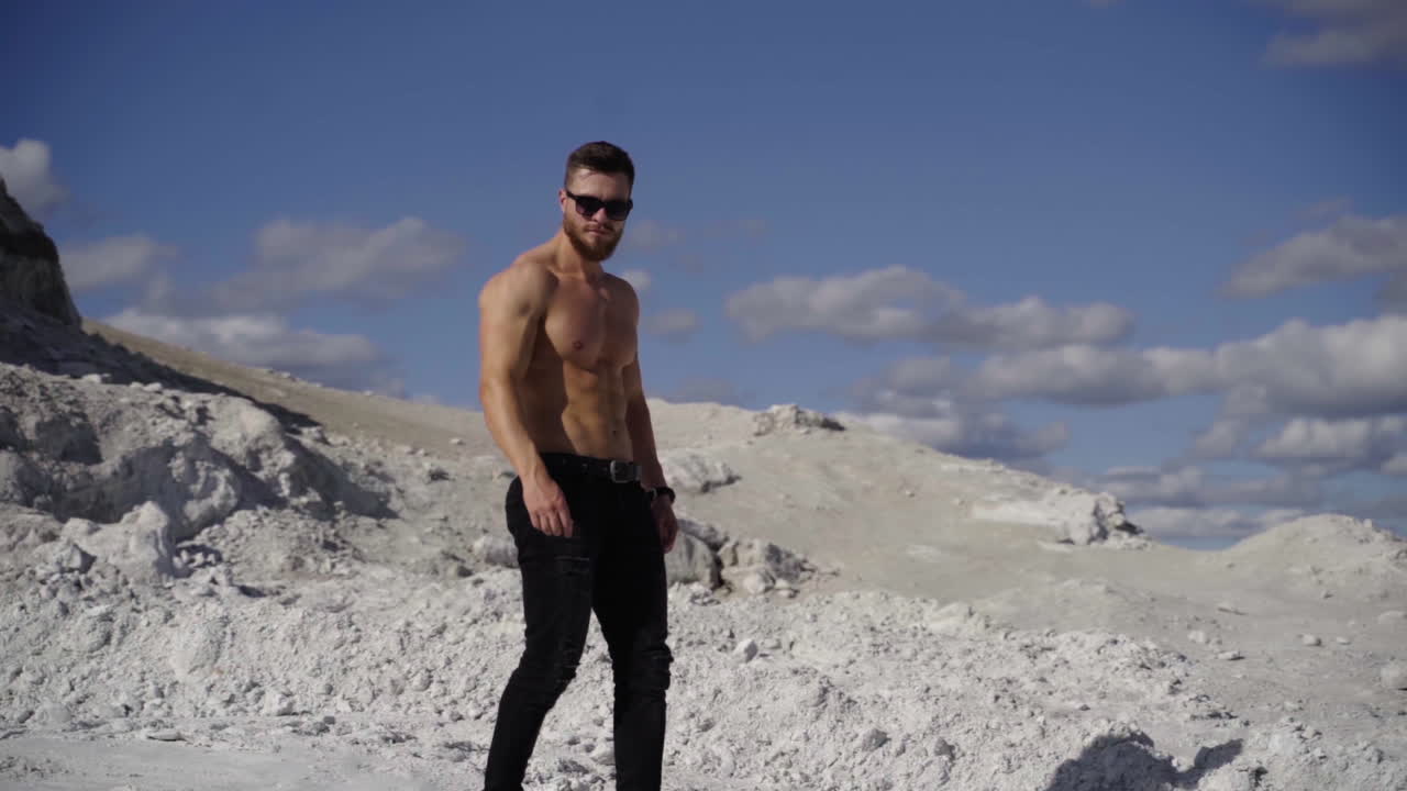 Male with naked nude torso. Healthy athletic fitness model posing outdoor