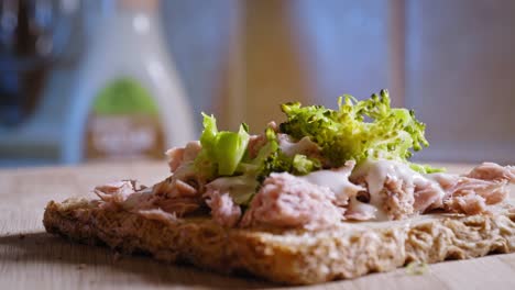 preparing anabolic toast sandwich with tuna and broccoli