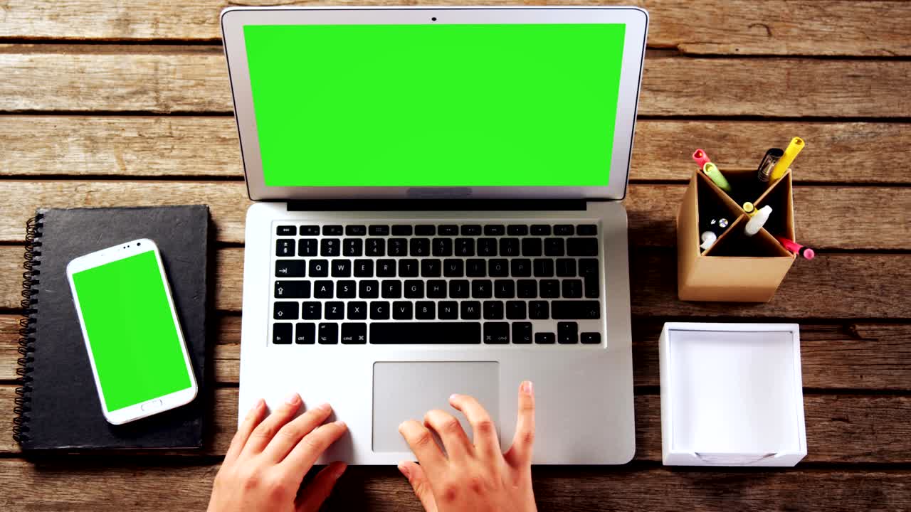 Executive using laptop at desk in office 4k