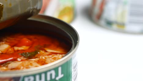 Canned-tuna-on-wooden-table