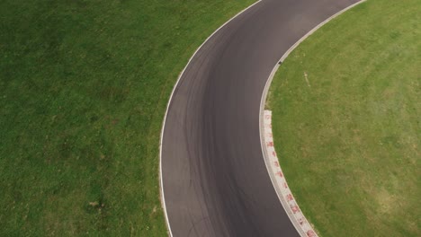 aerial of sports car race on professional polish race track