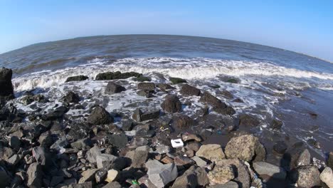 4k fisheye, choppy beach during the day