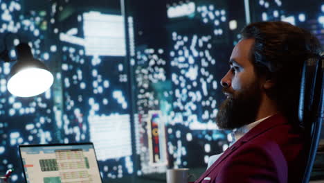 Powerful-director-of-affairs-enjoying-nighttime-tower-view