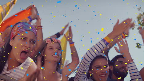 animation of confetti falling over people dancing and cheering during music concert