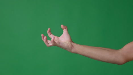 hand making a claw gesture