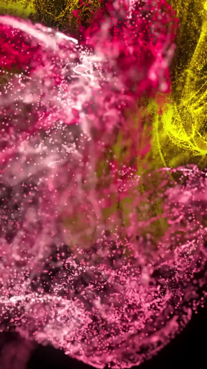 Animazione di punti multicolori che formano onde dinamiche su sfondo nero