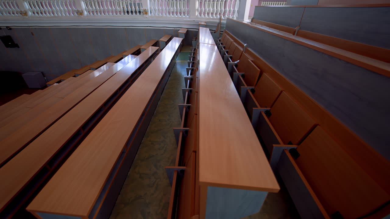 Empty lecture hall in University. Shot of empty college lecture hall in university