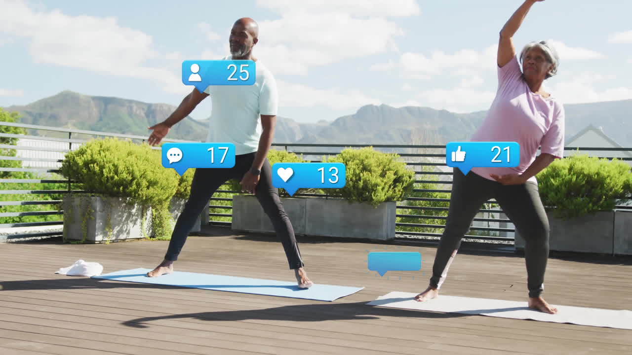 Woman stretching arm and man extending arms on rooftop yoga mats, showing floating fitness metrics
