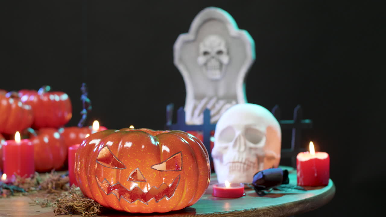 Halloween Decorations with Pumpkins, Skulls, and Tombstones