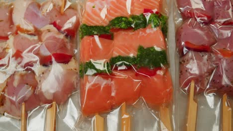 Prepped Salmon and Chicken Skewers