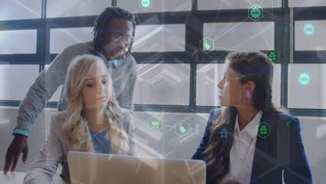 animation of network of connections with icons over diverse female and male coworkers in office