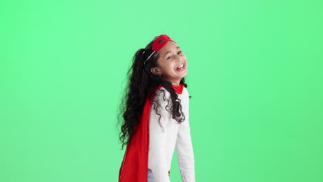 Girl Dressed as Superhero on Green Screen