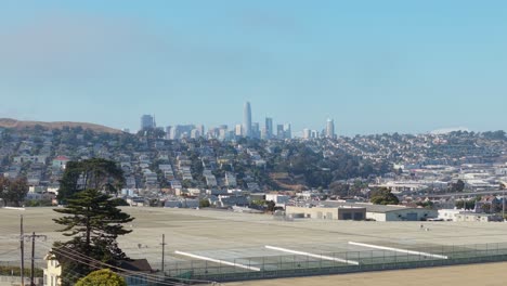 a static elevated perspective shows bernal’s patchwork of yards, gardens, and homes.