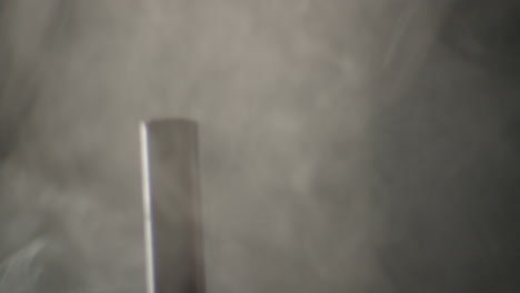 hammer hitting a big nail in a dramatic misty ambience