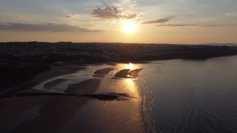 golden heavenly sunset rays aerial view reflected over romantic exotic beach coastline reverse right