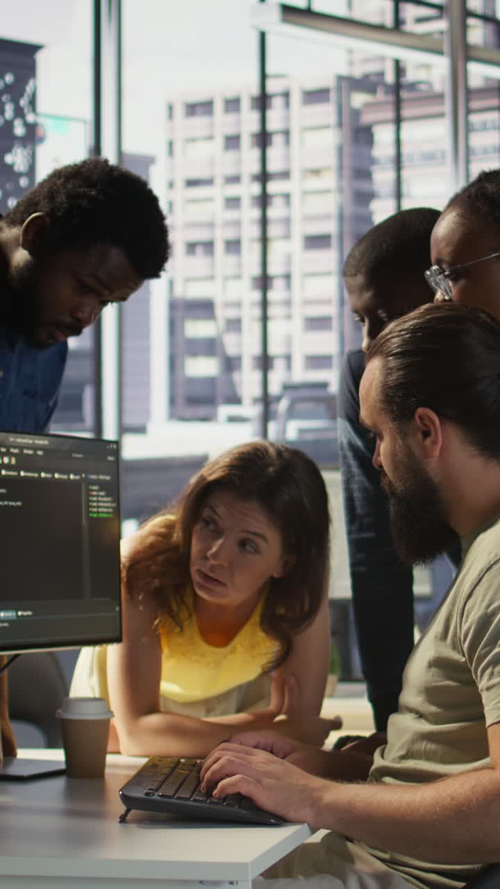 Vertical video Team of developers doing brainstorming, optimizing code