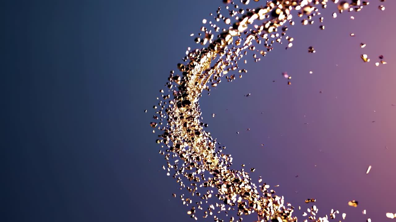 Dynamic video still of gold particles swirling in mid-air against a gradient background