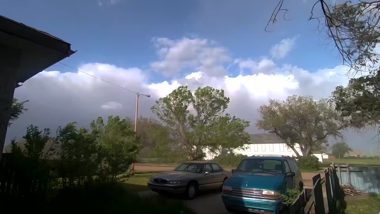 Front yard of a home in the country during a storm.  Taken during the day in Empress Alberta Canada.