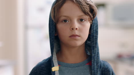 portrait-happy-little-boy-looking-at-camera-with-serious-expression