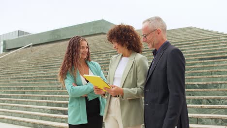 Business team having a meeting outdoors