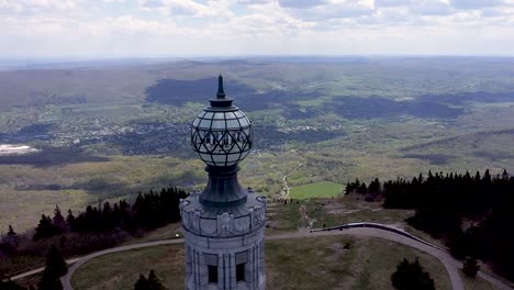 aerial footage of the war memorial tower at the summit of mt