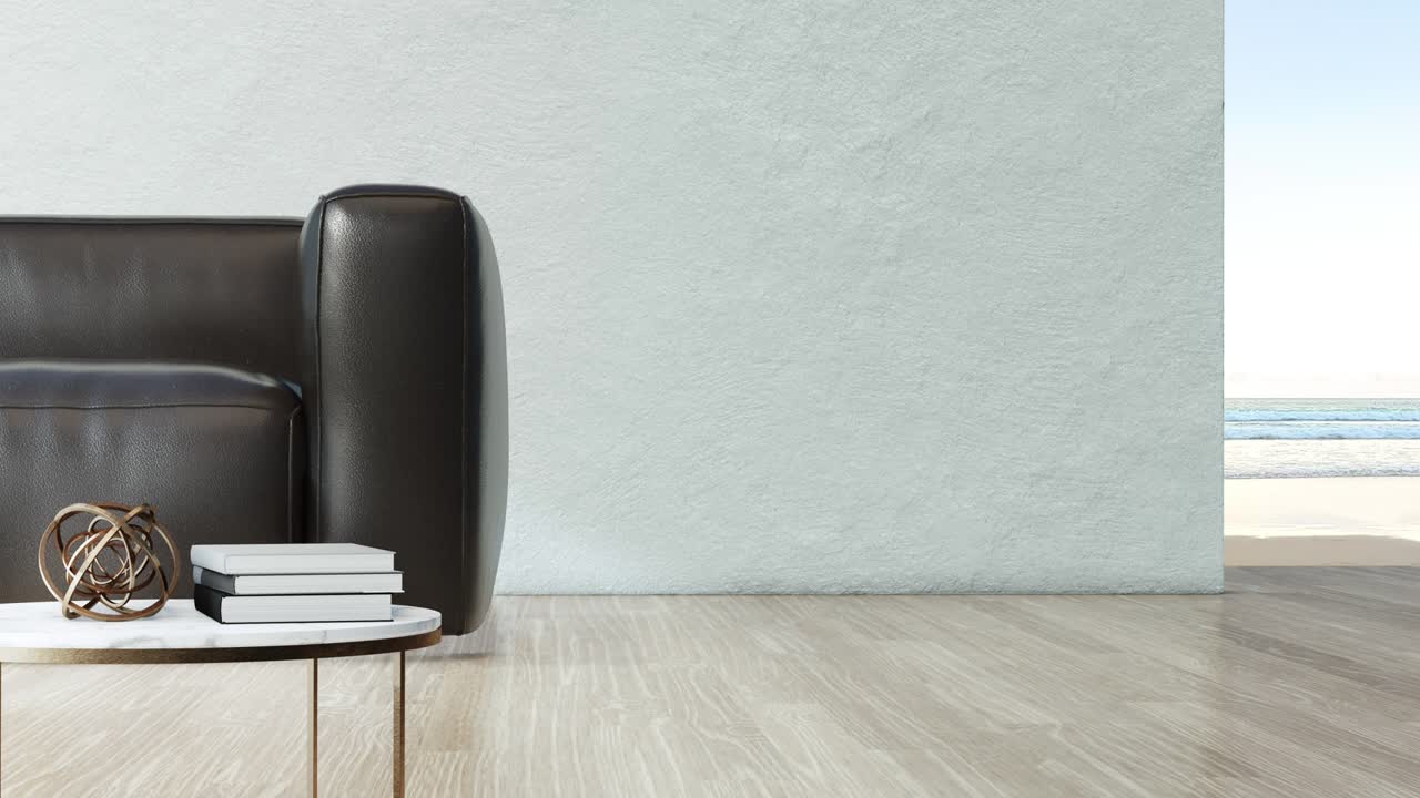 sala de estar con vista al mar de una lujosa casa de playa de verano con sofá negro en el suelo de madera.