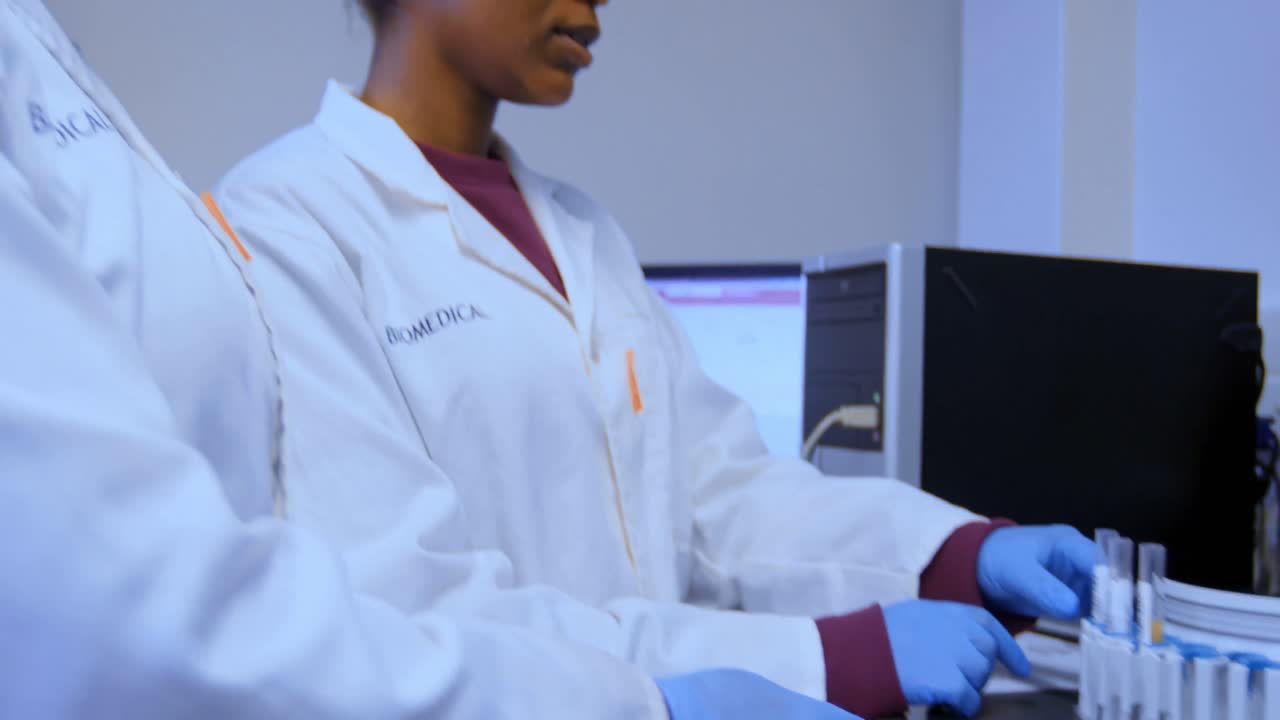 Doctors examine blood plasma in blood bank 4k