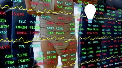 Animation-of-stock-market-data-processing-over-low-section-of-father-helping-baby-to-walk-at-home