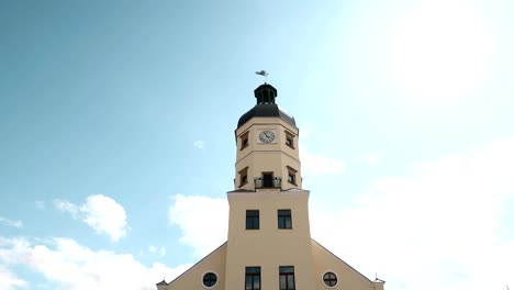 nesvizh, belarus. town hall in summer sunny day. famous landmark in nyasvizh. architecture of 16th century. zoom, zoom out