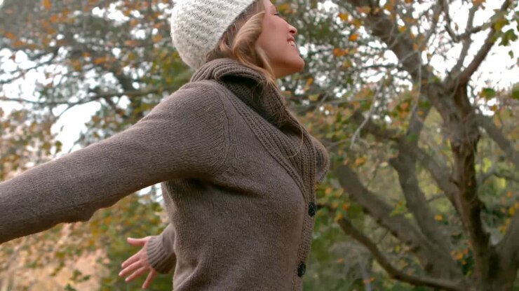 Happy woman spinning around