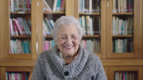 portrait of cheerful elderly mixed race woman laughing happy enjoying in library background enjoying retirement