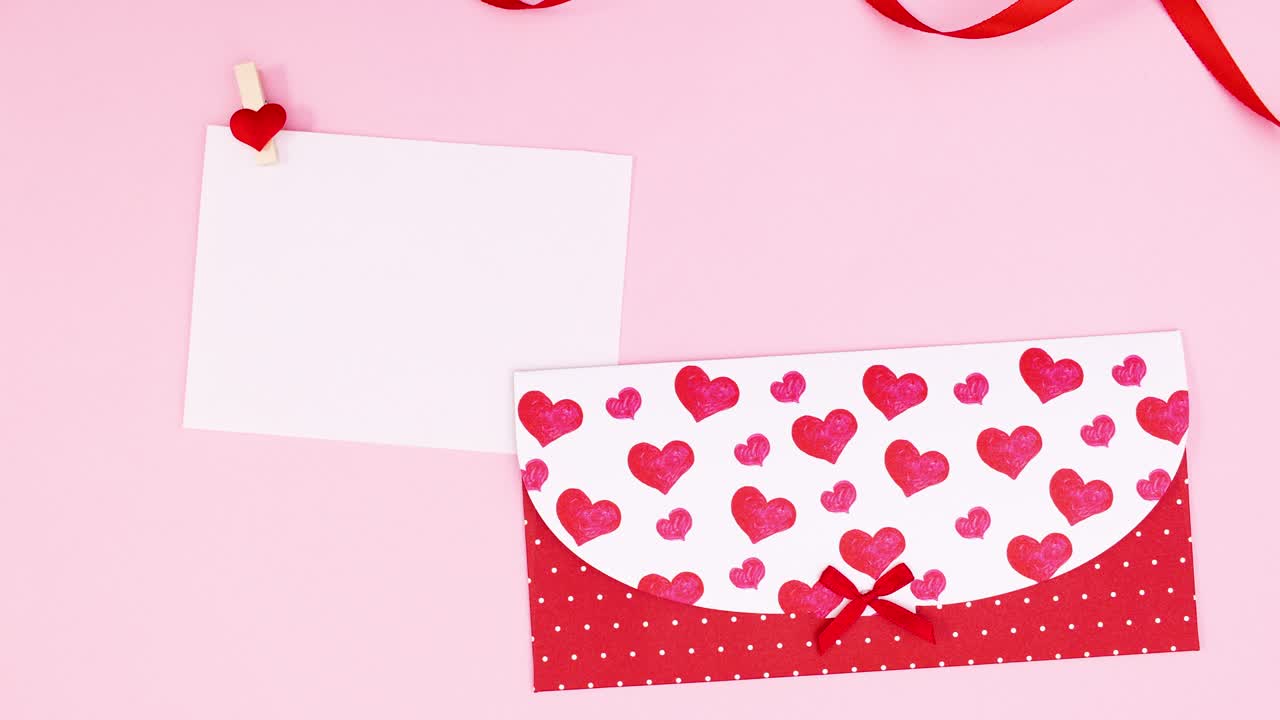 バレンタインデー・ストップ・モーション 紙が封筒から出てきてプレゼントとリボンが現れます - ライブドアニュース