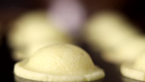 close up of freshly baked muffins in tray