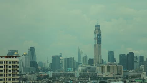 Fast-Paced-Bangkok-Cityscape-Time-Lapse-of-Cumulus-Clouds-Over-Baiyoke-Sky-Hotel,-Thailand