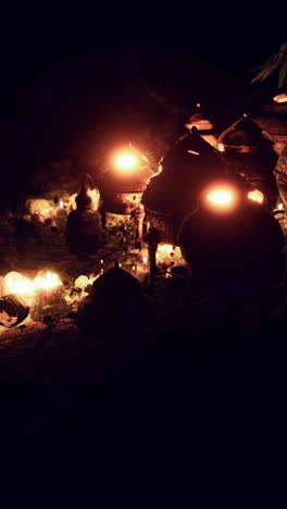 candles and lanterns glowing in the dark, creating a peaceful and spiritual atmosphere