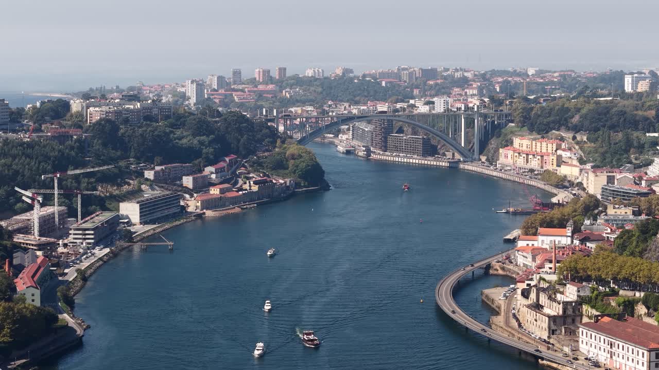 Aerial View of Porto, Portugal Douro River, Arrabida Bridge and Riverbank Buildings